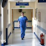 Hospitals warn staff under pressure as NHS waiting lists rise