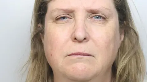 TVP A mugshot of Bruland, who has shoulder length grey/blonde hair and blue eyes.