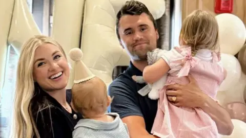 Instagram/charliekirk1776 Charlie Kirk, his wife, Erika, and their two children