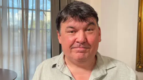BBC Graham Linehan in a light-coloured shirt