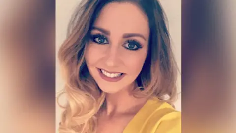 Facebook/Heidi Liddle Heidi Liddle with long blond hair and yellow top