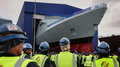 Getty Images Type 31 frigate HMS Venturer is rolled out from the build hall at Babcock Rosyth on May 27, 2025 in Rosyth, Scotland. The Royal Navy's new frigate, the HMS Venturer, is the first of the Inspiration Class Type 31 frigates built by Babcock International in Rosyth.