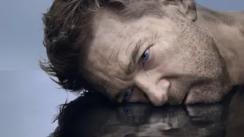 Seamus Ryan/RSC Close up side shot of Kenneth Branagh's face & his reflection
