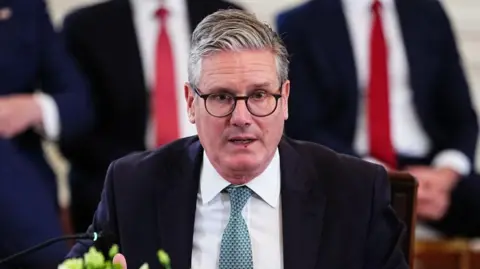 Getty Images Keir Starmer, UK prime minister, speaks during a multilateral meeting with European leaders in the East Room of the White House in Washington, DC