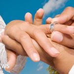 South Africa’s Constitutional Court rules that men can take wife’s surname