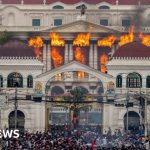 Nepal parliament set on fire after PM resigns over anti-corruption protests